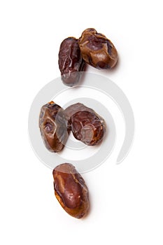 Medjool dates isolated on a white background.