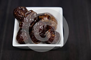 Medjool Dates on wooden