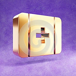 Medkit icon. Gold glossy Medkit symbol isolated on violet velvet background.