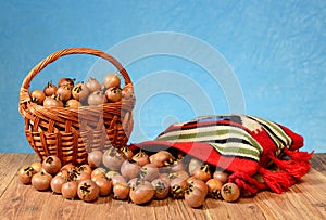 Medlar in a wicker basket and in a etno bag