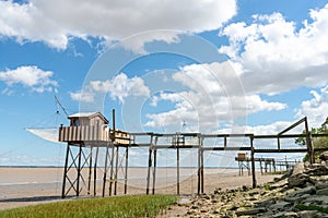 Medoc, Gironde estuary, France. Fishing huts on stilts called carrelet