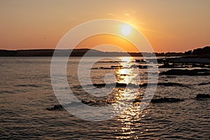 Medulin - Beautiful sunset at rocky beach in coastal town Medulin, Istria peninsula, Croatia, Europe. Romantic view