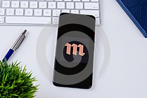 Meduza app logo on a smartphone screen.