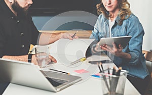 Meet one-on-one. Business meeting. Teamwork. Businessman and businesswoman sitting at table.