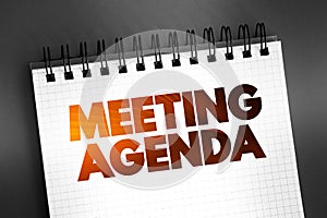 Meeting Agenda text on notepad, concept background