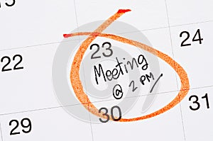 Meeting appointment written in a calendar.