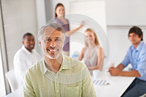 Meeting with colleagues. Businesspeople listening to a presentation.