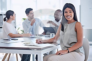 Meeting, corporate and portrait of a business woman planning a project with her team in the office. Happy, smile and