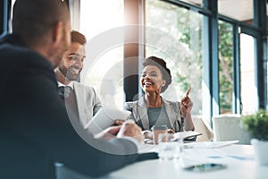 Meeting, diversity and business people in discussion in the office boardroom planning a project. Collaboration, teamwork