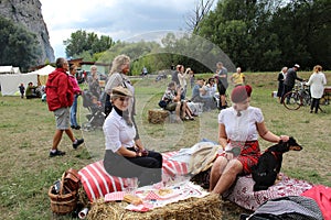 Meeting of Historical Bicycles - people in historical costumes having picnic