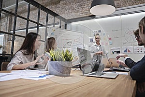 Meeting of multiracial professional teamwork with coworkers at the business office