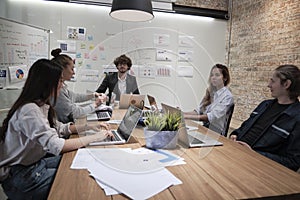 Meeting of multiracial professional teamwork with coworkers at the business office