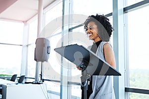 Meeting, presentation and female presenter in the office boardroom for a business conference. Corporate speech, speaker