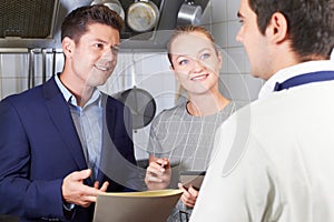 Meeting Of Restaurant Team In Kitchen