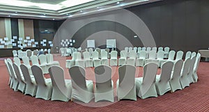 Meeting room arranged in a circle for business meetings