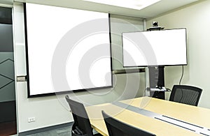 Meeting room with projector and video conference on white projector