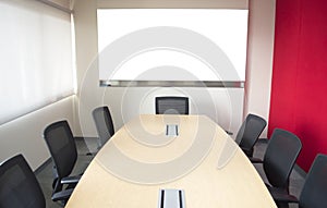 Meeting room with table chair and whiteboard