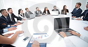 Meeting of shareholders of the company at the round - table. photo