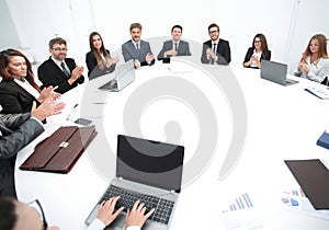 Meeting of shareholders of the company at the round - table. photo