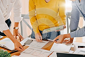 Meeting of software development design UX UI application with paper and tablet, Closeup shot