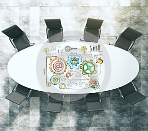 Meeting table with business scheme concept