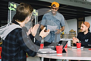 Meeting Talking Discussion Brainstorming Communication Concept. African American businessman in casual wear holding