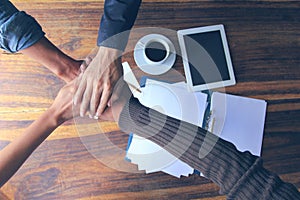 Meeting teamwork concept,Friendship,Group people with stack of hands showing unity after successful negotiations at office