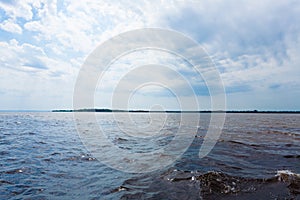 Meeting of Waters. Brazilian rivers confluence from Manaus photo