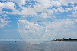 Meeting of Waters. Brazilian rivers confluence from Manaus photo