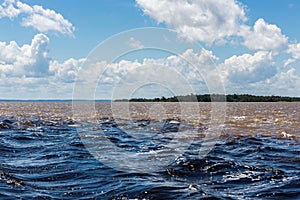 The Meeting of Waters Encontro das ÃÂguas, a natural phenomenon with the Rio Negro blending with the Amazon River in the State of photo