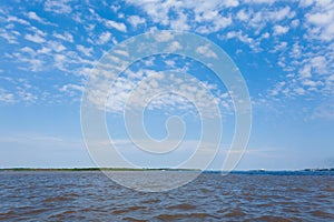 Meeting of Waters. Brazilian rivers confluence from Manaus photo