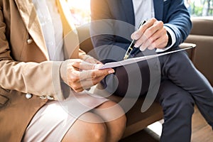 meeting in workplace concept, business people working with document, tablet and laptop computer