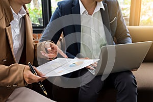 meeting in workplace concept, business people working with document, tablet and laptop computer