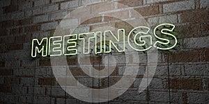 MEETINGS - Glowing Neon Sign on stonework wall - 3D rendered royalty free stock illustration