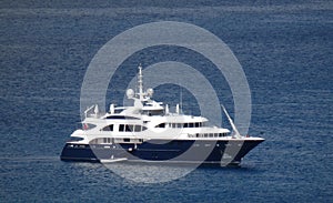 A mega-yacht at anchor in admiralty bay