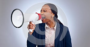 Megaphone, speech and screaming business woman in studio for change, transformation or freedom on grey background