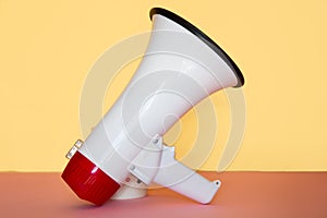 Megaphone on a yellow background. close-up