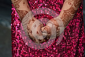 Mehendi on hands of Indian woman