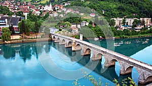 Mehmed Pasha Sokolovic Old Stone historic bridge over Drina river in Visegrad,Bosnia and Herzegovina photo