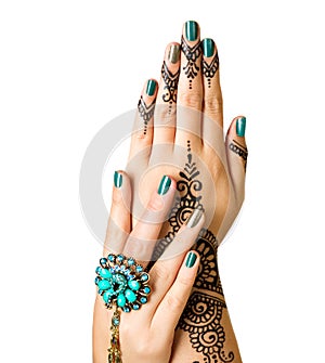 Mehndi tattoo isolated on white. Woman Hands with black henna tattoo