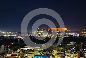 mehrangarh fort with city night landscape view with lights at night