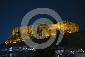 Mehrangarh Fort at night in Jodhpur, India. Scenic travel destination and famous tourist attraction in Rajasthan, India.