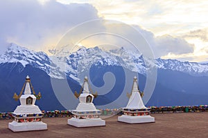 Meili snow mountain and Tibetan stupa, Feilai temple, Deqing, Yunnan, China.