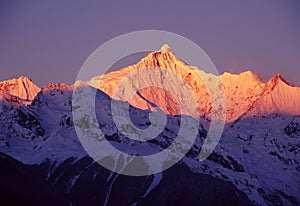 Meili Snow Mountains at sunrise photo