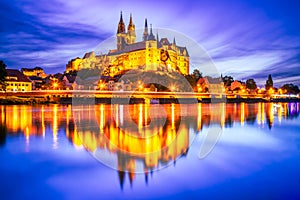 Meissen, Germany. Twilight blue sky, Albrechtsburg castle and cathedral on the River Elbe, Saxony