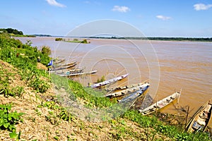 Mekong Rive and small fishing boat photo