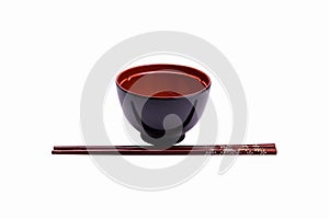 Melamine bowl and wooden chopstick photo