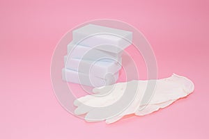 Melamine sponges on pink background