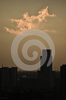 melancholic image with strange cloud over skyscraper at Buenos Aires