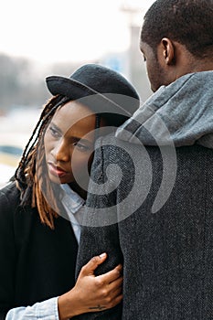 Melancholic mood. African American couple